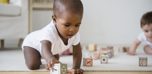Toddler playing with blocks